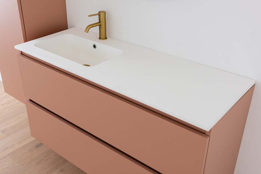Badkamermeubel Dotan abrikoos hangend met enkele wastafel links mat wit 120cm
