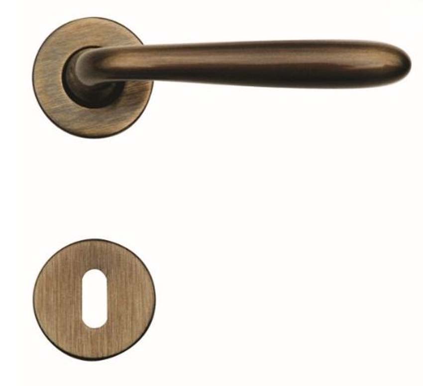 Deurkruk pro Alma brons rond complete set met rozetten en sleutelplaat