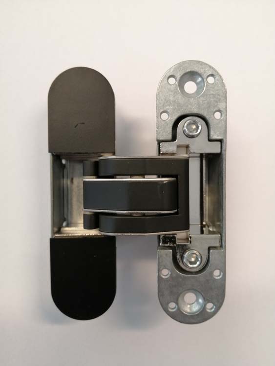 Verdoken scharnier voor een invisible flat deur