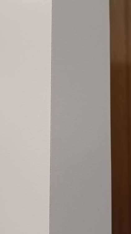 Porte intérieure complète Uran blanche 201,5x63cm alvéolaire réversible + châssis 16,5cm