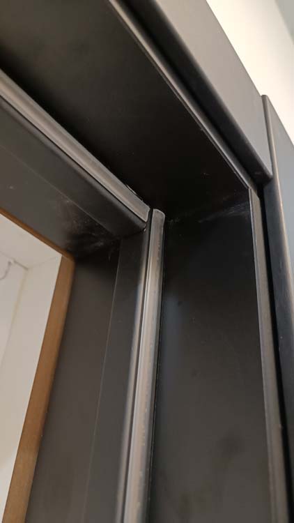 Porte intérieure complète Nature Wood chêne 201,5x83cm aggloméré tubulaire vertical réversible + châssis noir 16,5cm