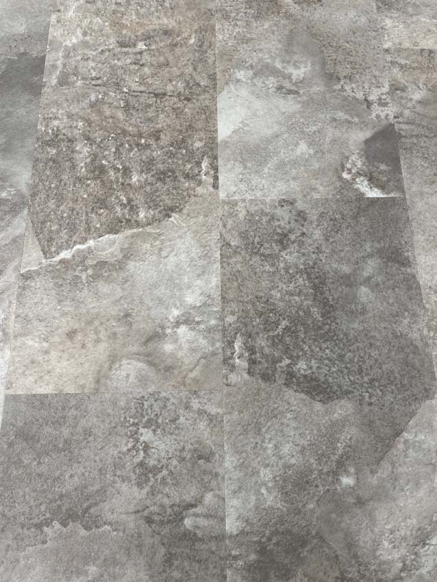 Vinyl vloer Kasteel tegel 5mm grijs 61,2x30,6cm Vinyl vloer Kasteel tegel 5mm grijs 61,2x30,6cm