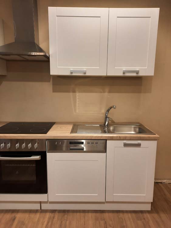 Cuisine Njord blanc rustique 280cm - hotte murale en inox - sans appareils